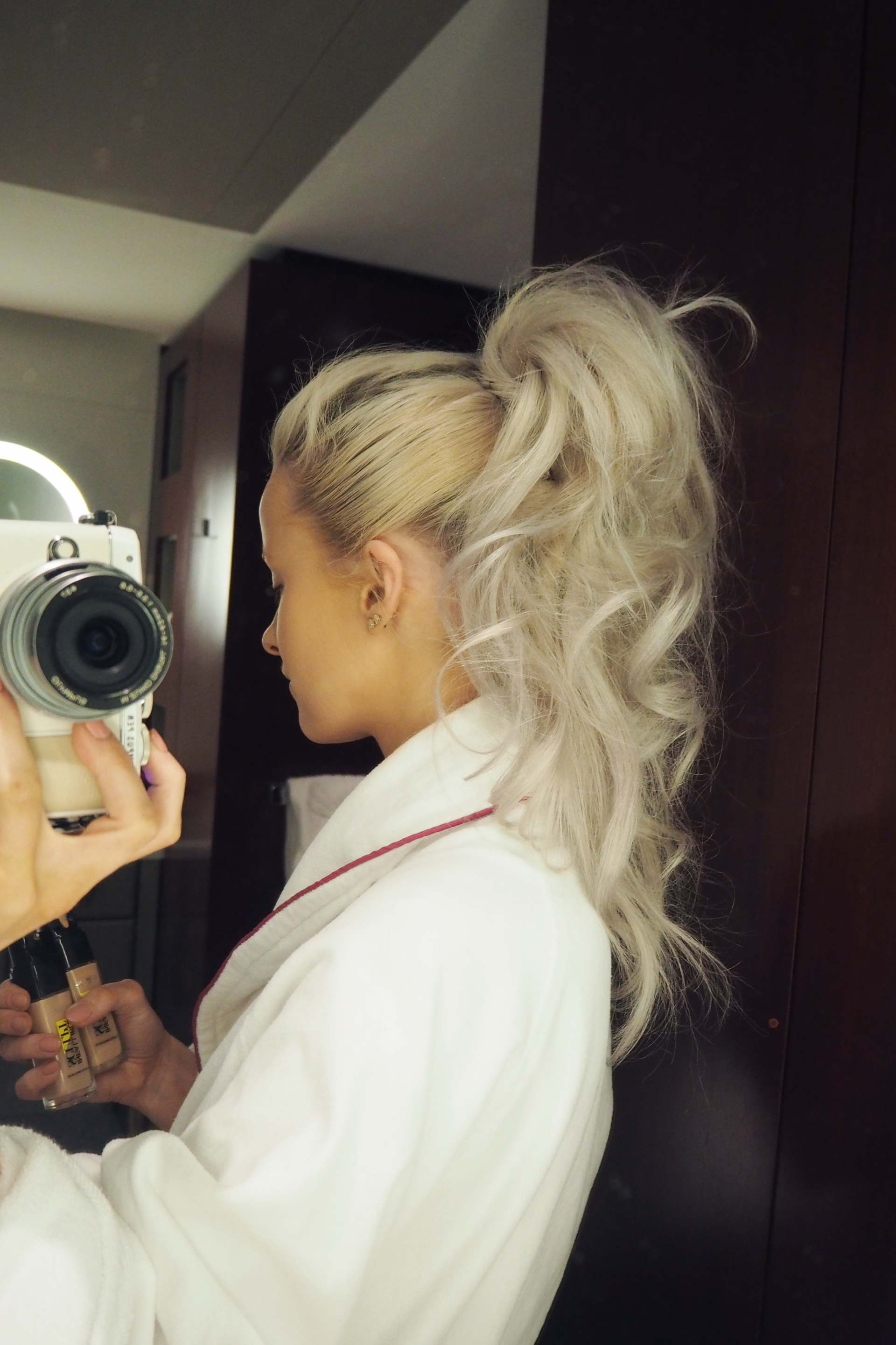 inthefrow white hair curly high ponytail